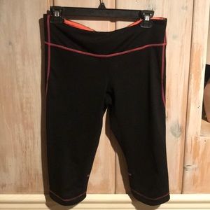 Two pairs calf length workout pants